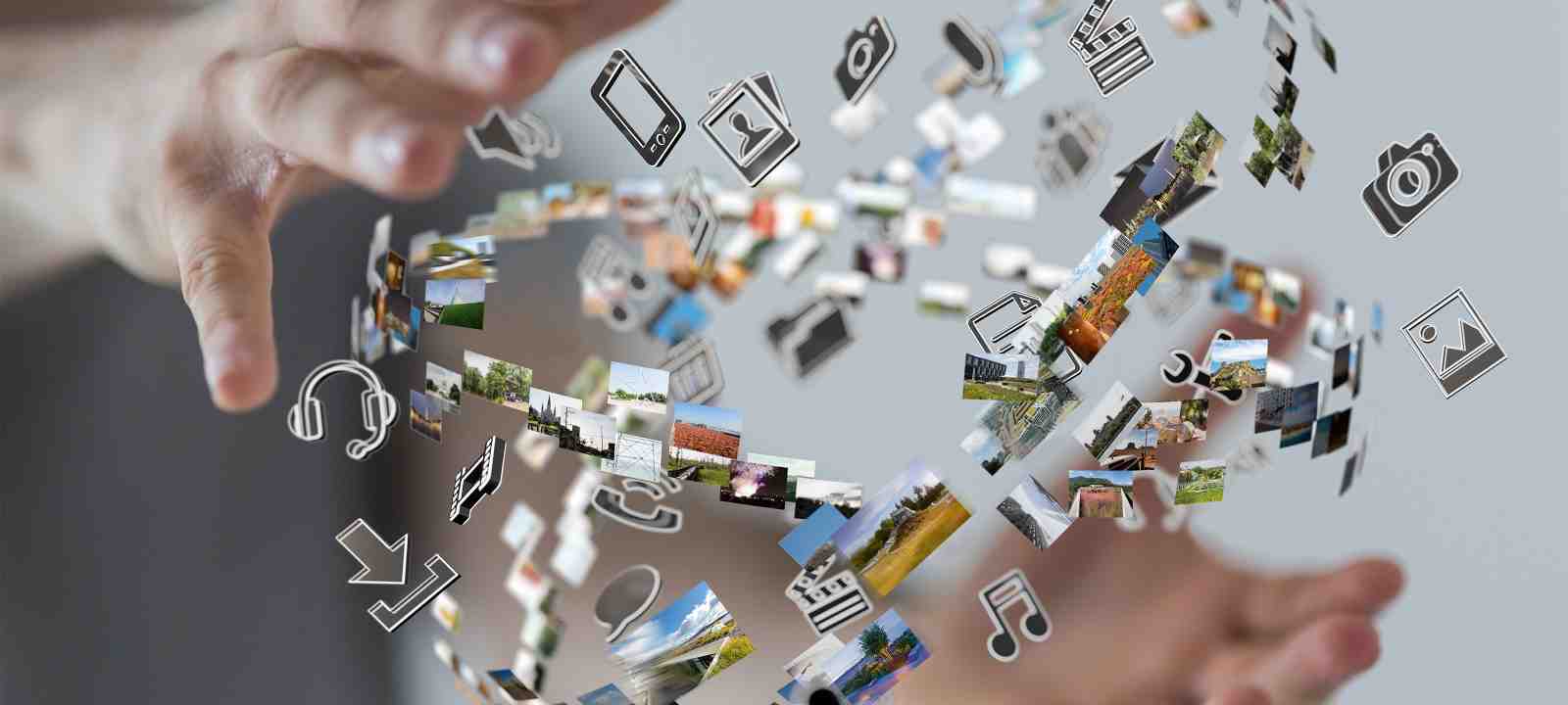 Hände umgreifen fliegende Medien