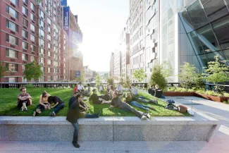 Besucher  der „High Line“ liegen auf dem Rasen