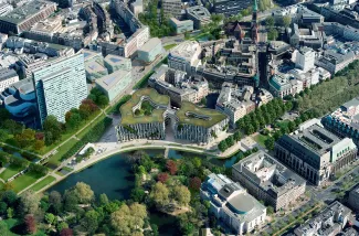 Wie das Modellbild zeigt, binden die grünen Dachflächen den Kö-Bogen in die Umgebung des Erholungsraums Hofgarten ein. © „die developer“ Projektentwicklung GmbH Luftaufnahme des Kö-Bogens